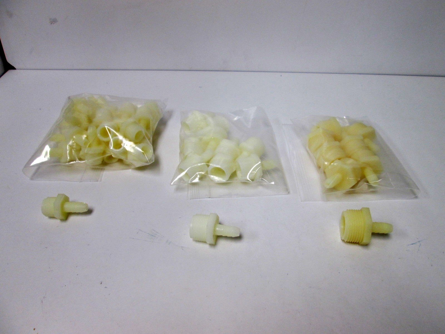 Used Lot of 45 3/8" Barbed Tube Fittings, Connections: 1/2" NPT 3/4" NPT 1" NPT