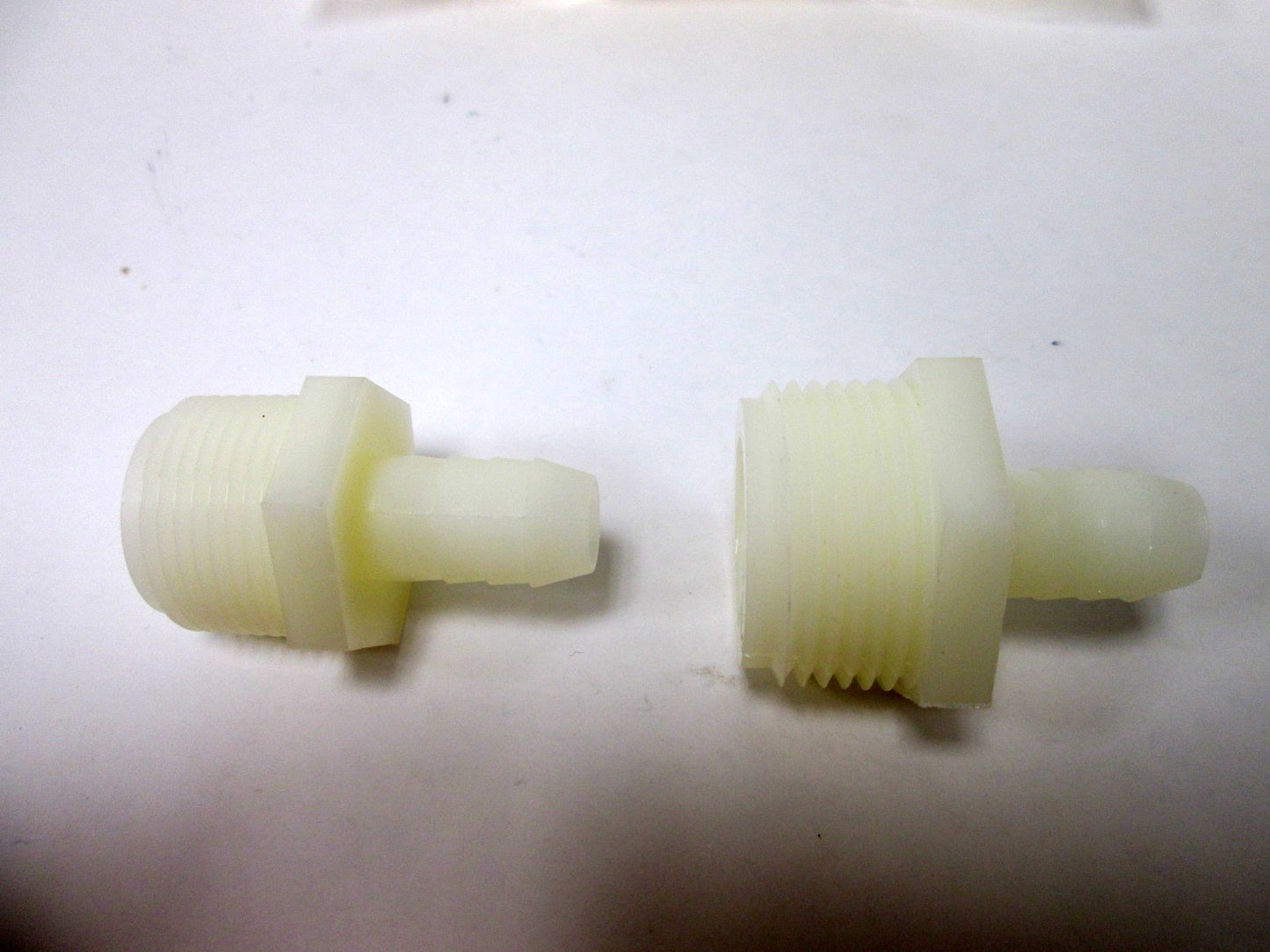 Used Lot of 24 1/2" Barbed Tube Fittings, Connections: 3/4" NPT and 1" NPT