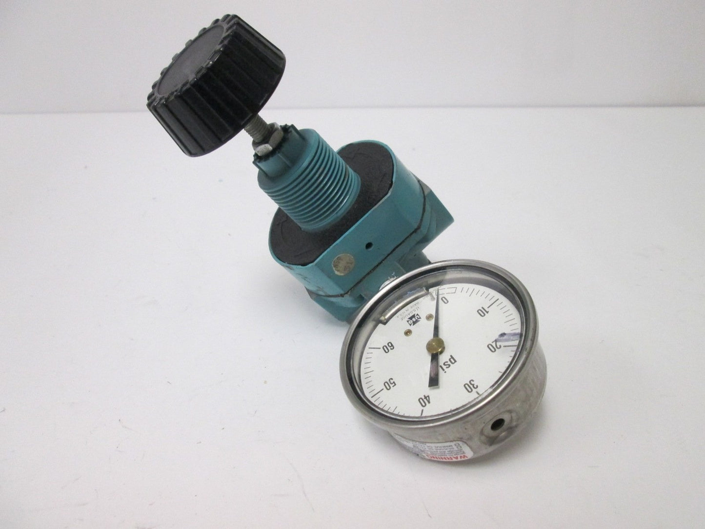 Used Wilkerson R10-02-000 Regulator, Range: 5-125psi, 1/4" NPT, With 0-60psi Gauge