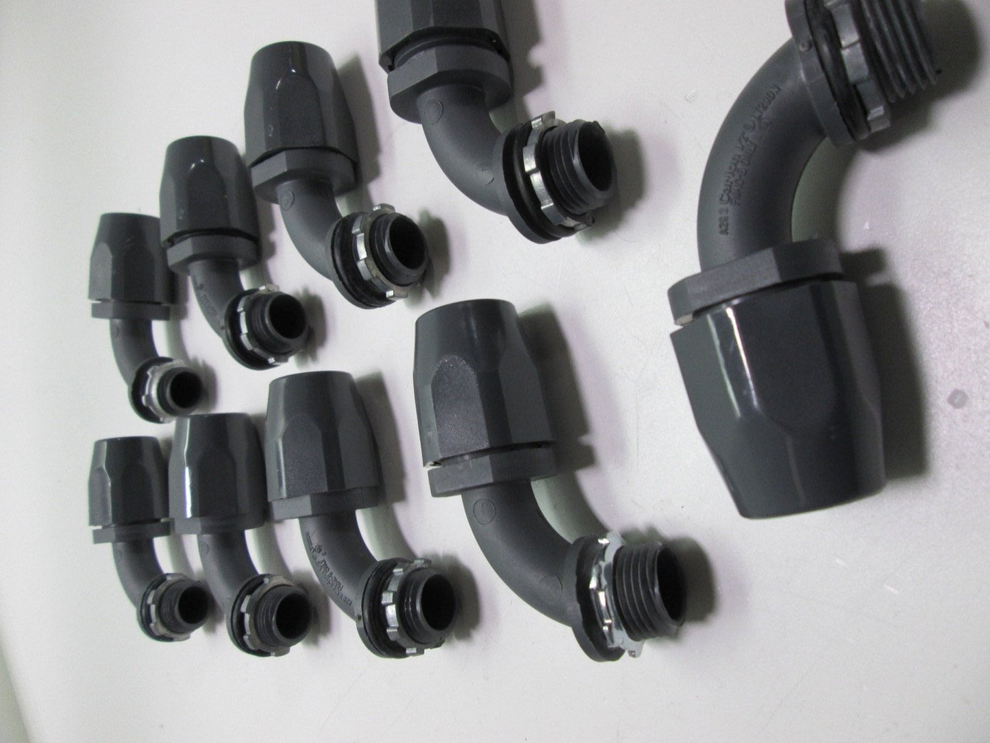 New – Open box Lot of 9 Carlon LT20DN A292 Non-Metallic 1/2" 90 Degree Liquid Tight Fittings