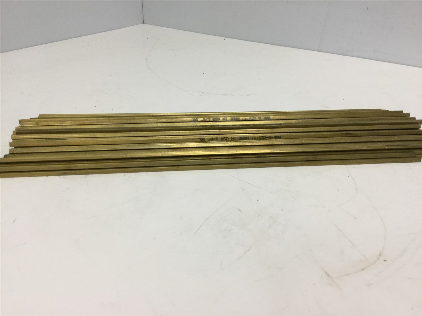 Used Lot of 97 Mak-A-Key Brass Key Stock, Dimensions: 1/8" x 1/8" x 12" Long