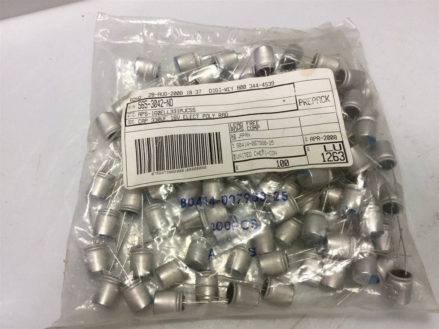 New Lot of 100- United APS-160ELL331MJC5S Capacitor 330uF 16V Alum Poly Radial