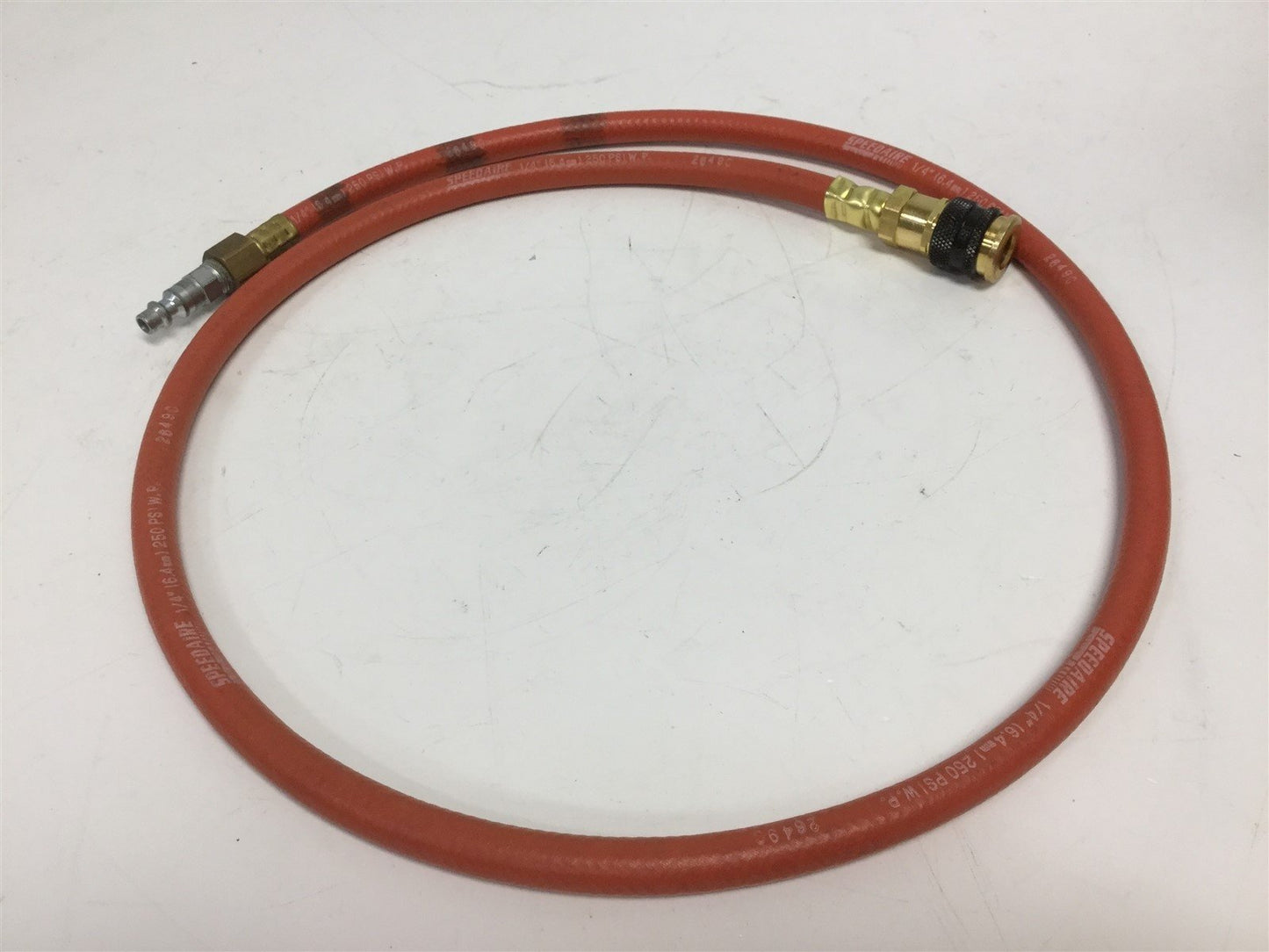 Used SpeedAir 2649C Pneumatic Hose 1/4" (6.4mm) 250 PSI W.P. 4' W/ Quick Disconnect