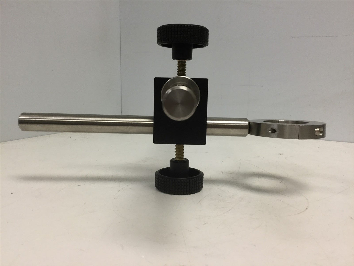 Used Edmund Scientific Instrument Rod, Ring Diameter: 1.76", Rod Diameter: 0.75"