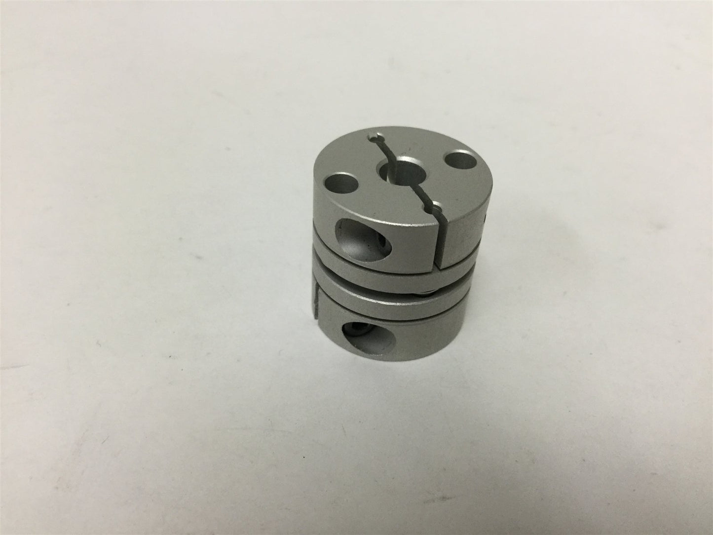 Used Shaft Coupling, Inside Dia: 5mm to 5mm, Outside Dia: 19mm, Length: 19.7mm