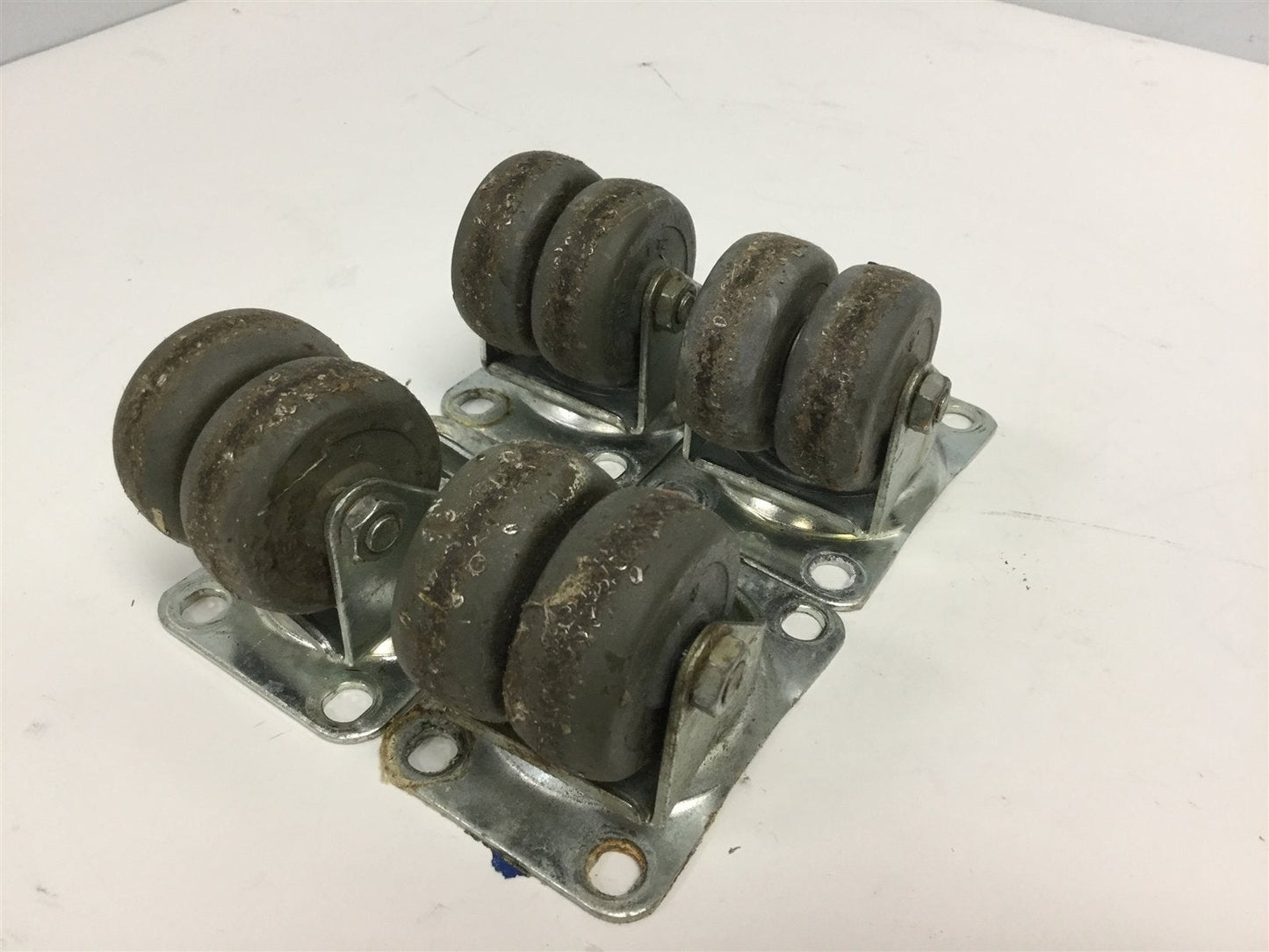Used Lot of 4 Casters, Plate Dimensions: 3.625" x 2.5", Wheel Dimensions: 1-7/8" x 1"