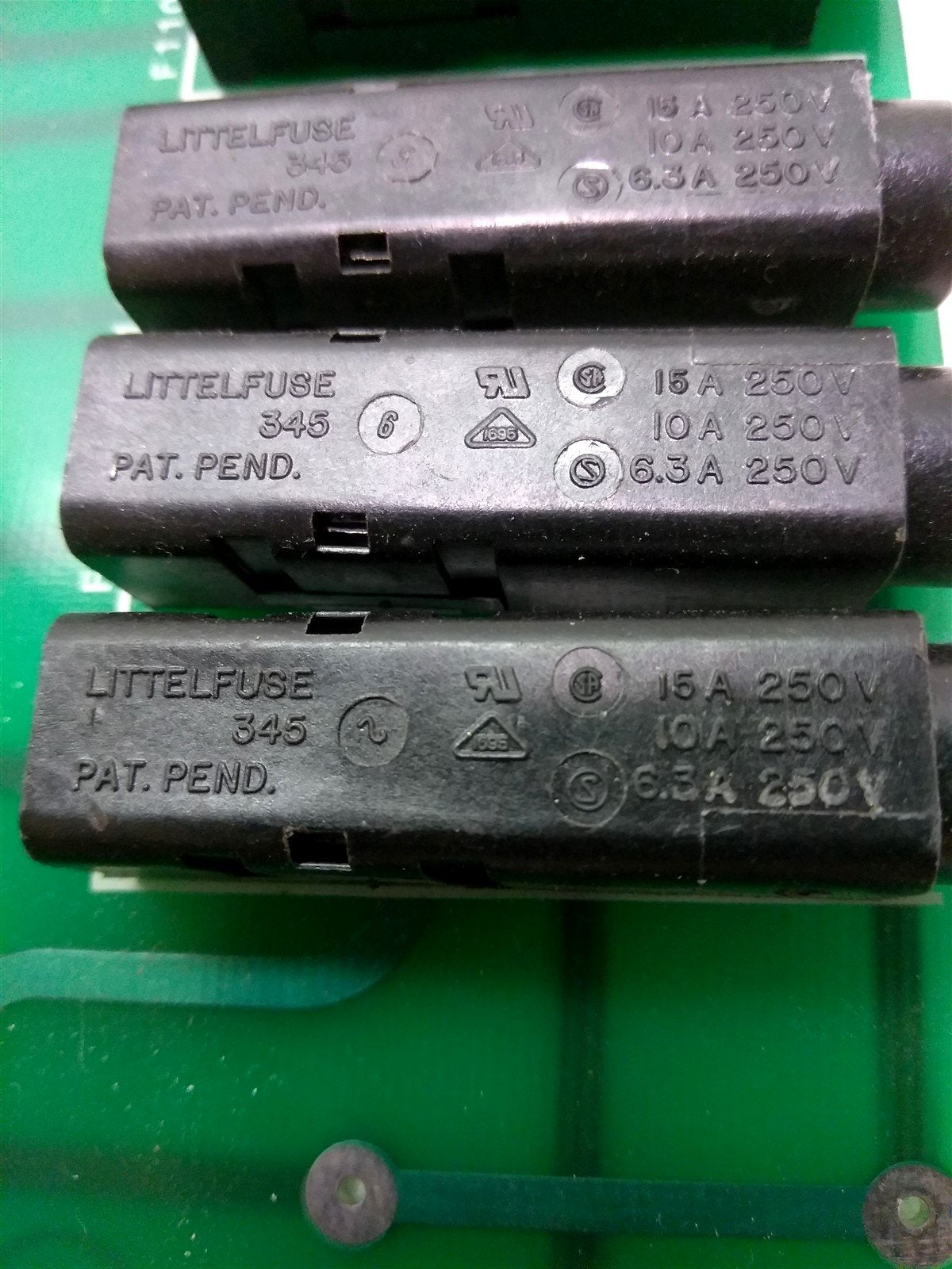 Used Lumonics E84A3341D Rev 4 Fuse and Connector Card, 11x Fuse Holders, 415V Fuses