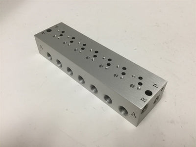New SMC SS3YJA5-41-07-01T Manifold Base, For 7x SY3000 Valves, Ports: 1/8" NPT