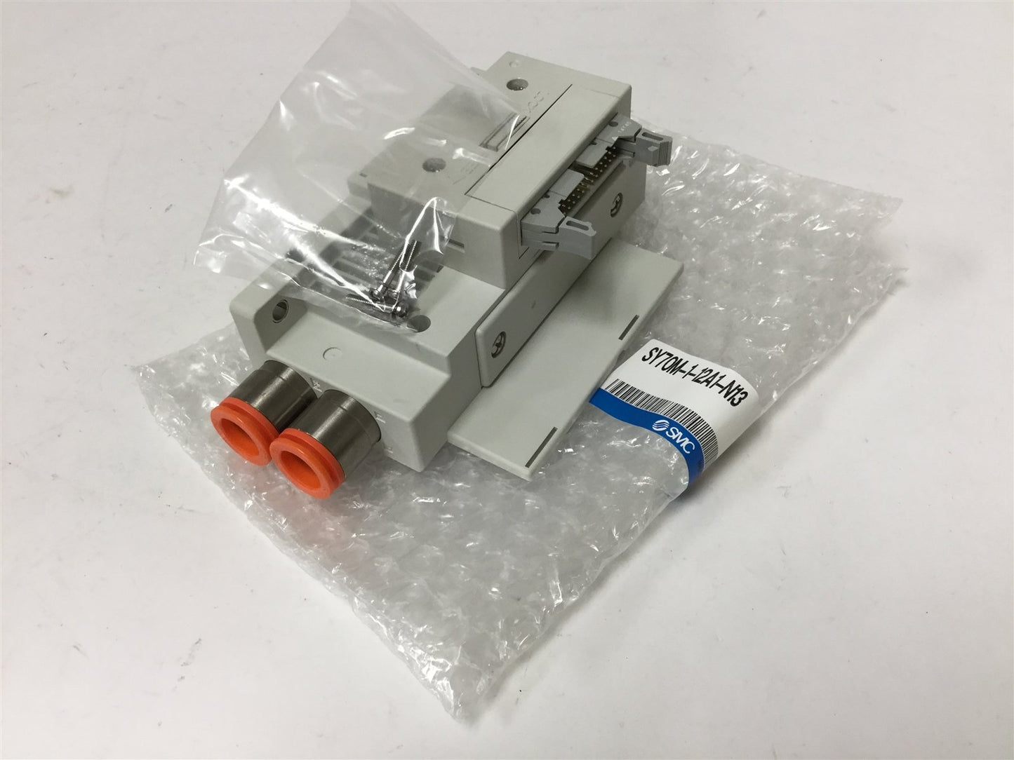 New SMC SY70M-1-12A1-N13 Manifold Supply/Exhaust Block, 1/2" Push-In Connections