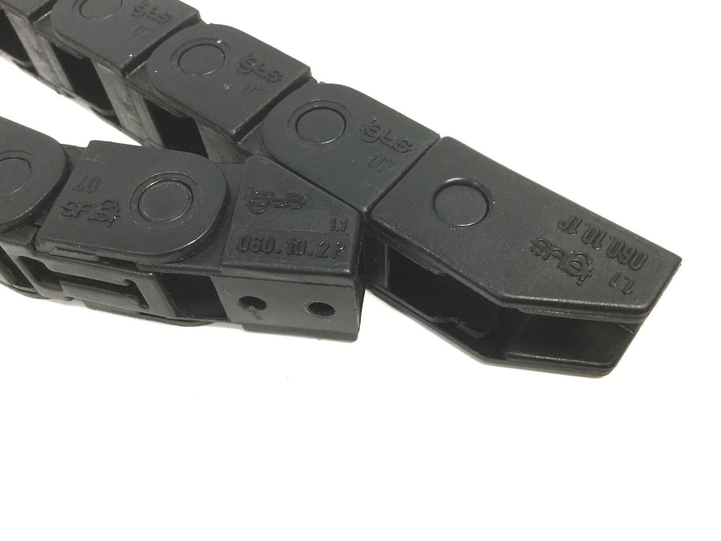 Used Igus 07-10-018 Energy Chain Bend Radius: 18mm, Length: 15-7/8", In-Width: 10mm