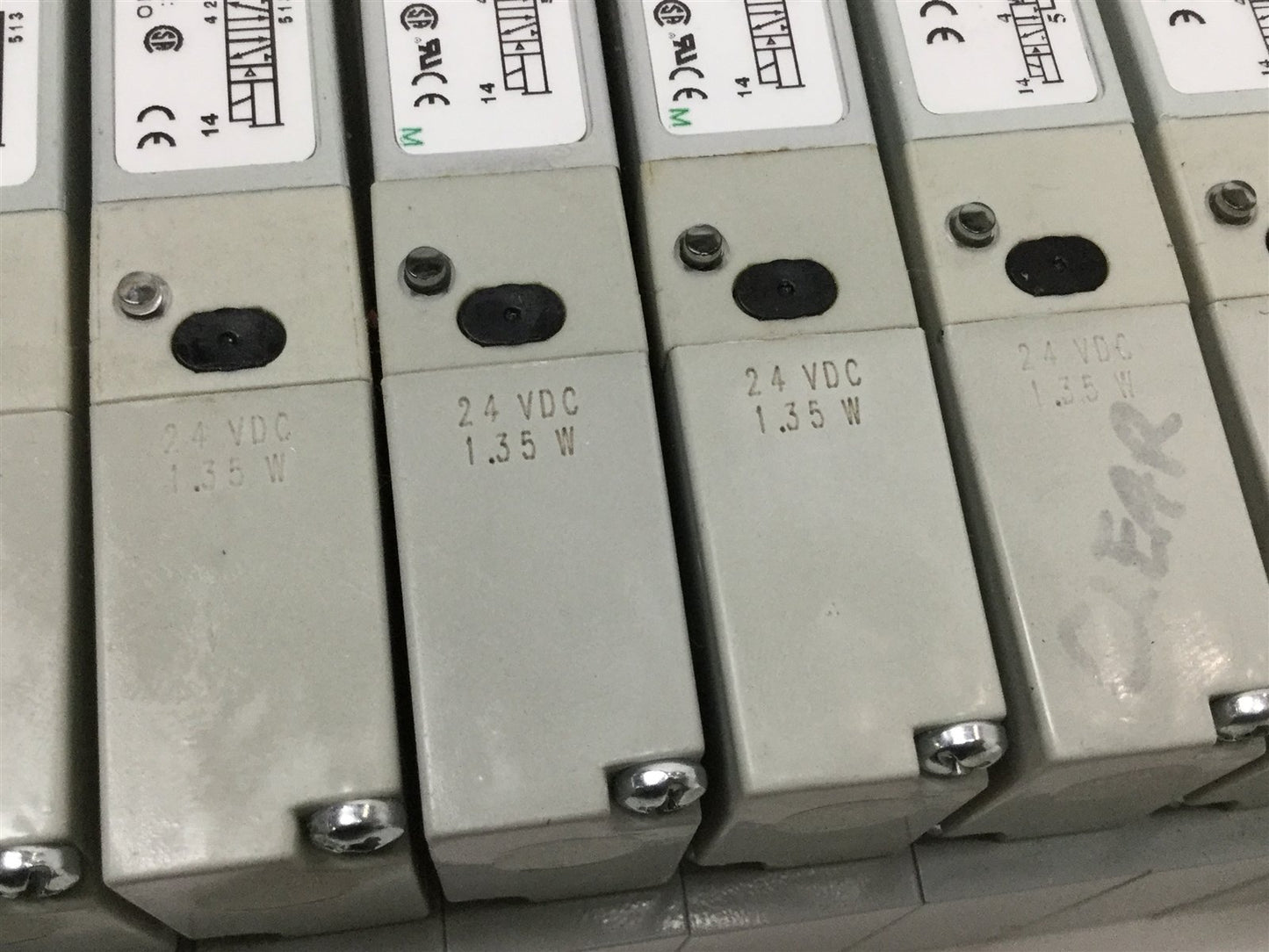 Used Bank of 8 Numatics 052BBDZ2ML, 052BA4Z2ML Solenoid Valves w/ Manifold 24VDC