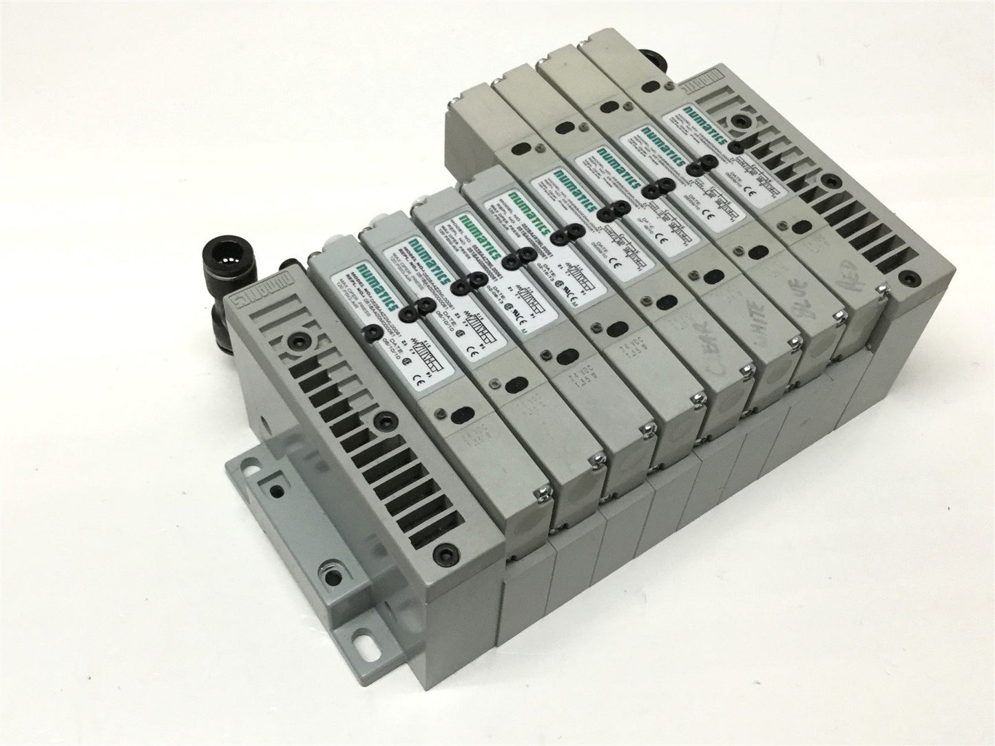 Used Bank of 8 Numatics 052BBDZ2ML, 052BA4Z2ML Solenoid Valves w/ Manifold 24VDC