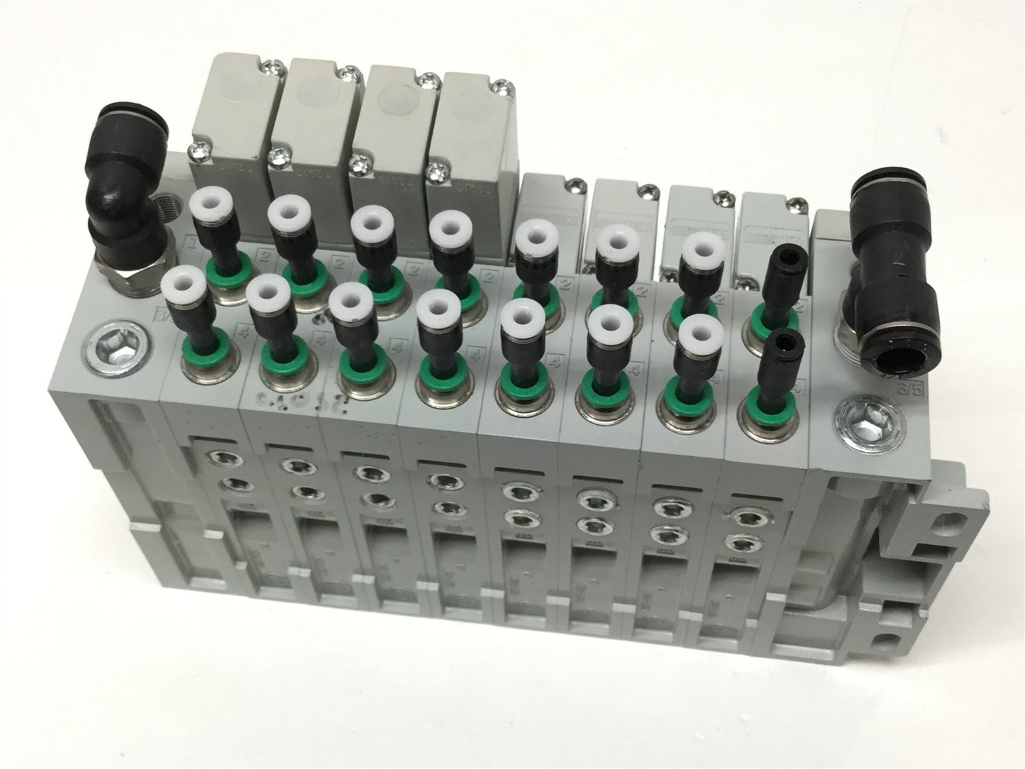 Used Bank of 8 Numatics 052BBDZ2ML, 052BA4Z2ML Solenoid Valves w/ Manifold 24VDC