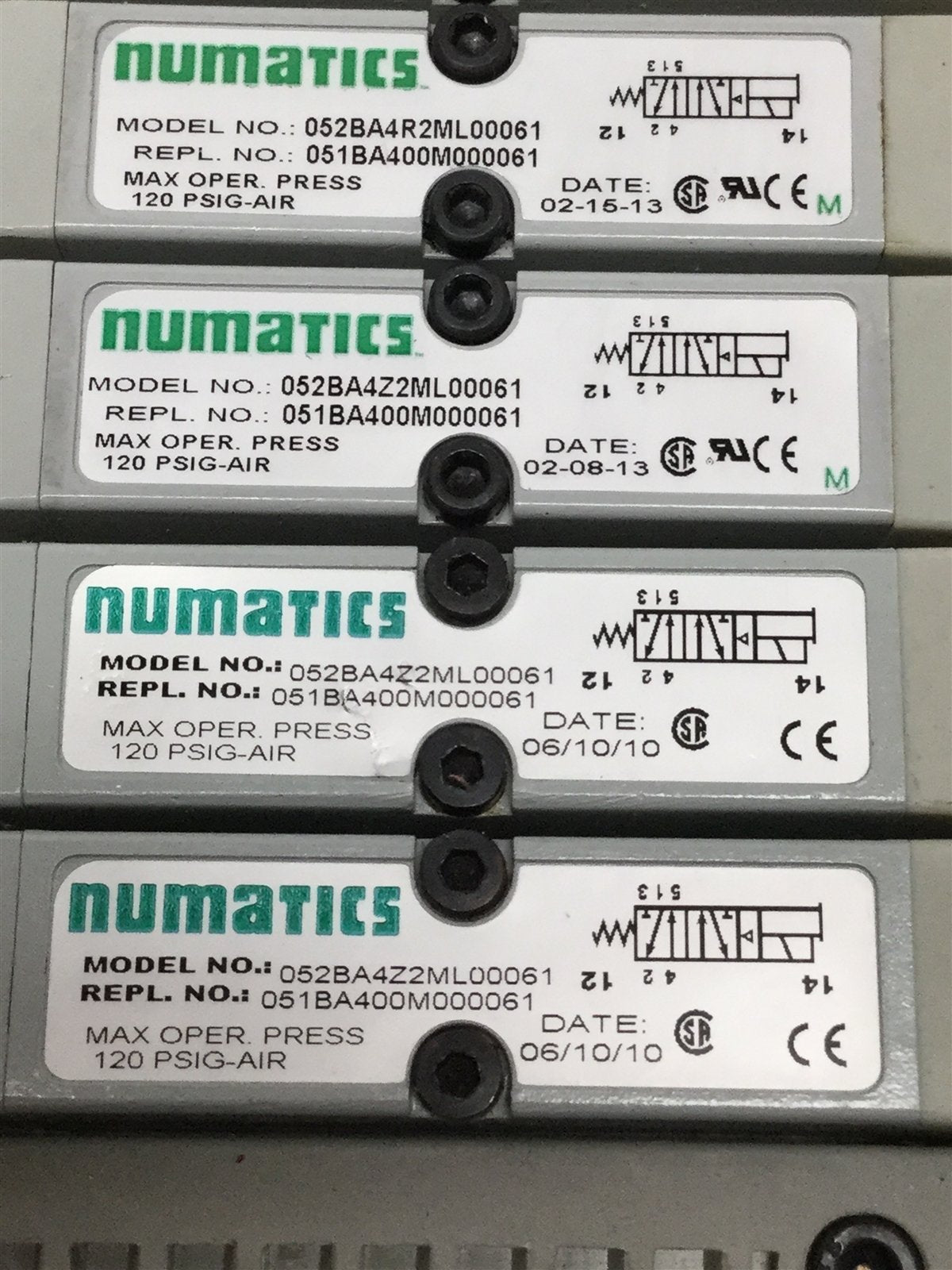 Used Bank of 8 Numatics 052BBDZ2ML, 052BA4Z2ML Solenoid Valves w/ Manifold 24VDC