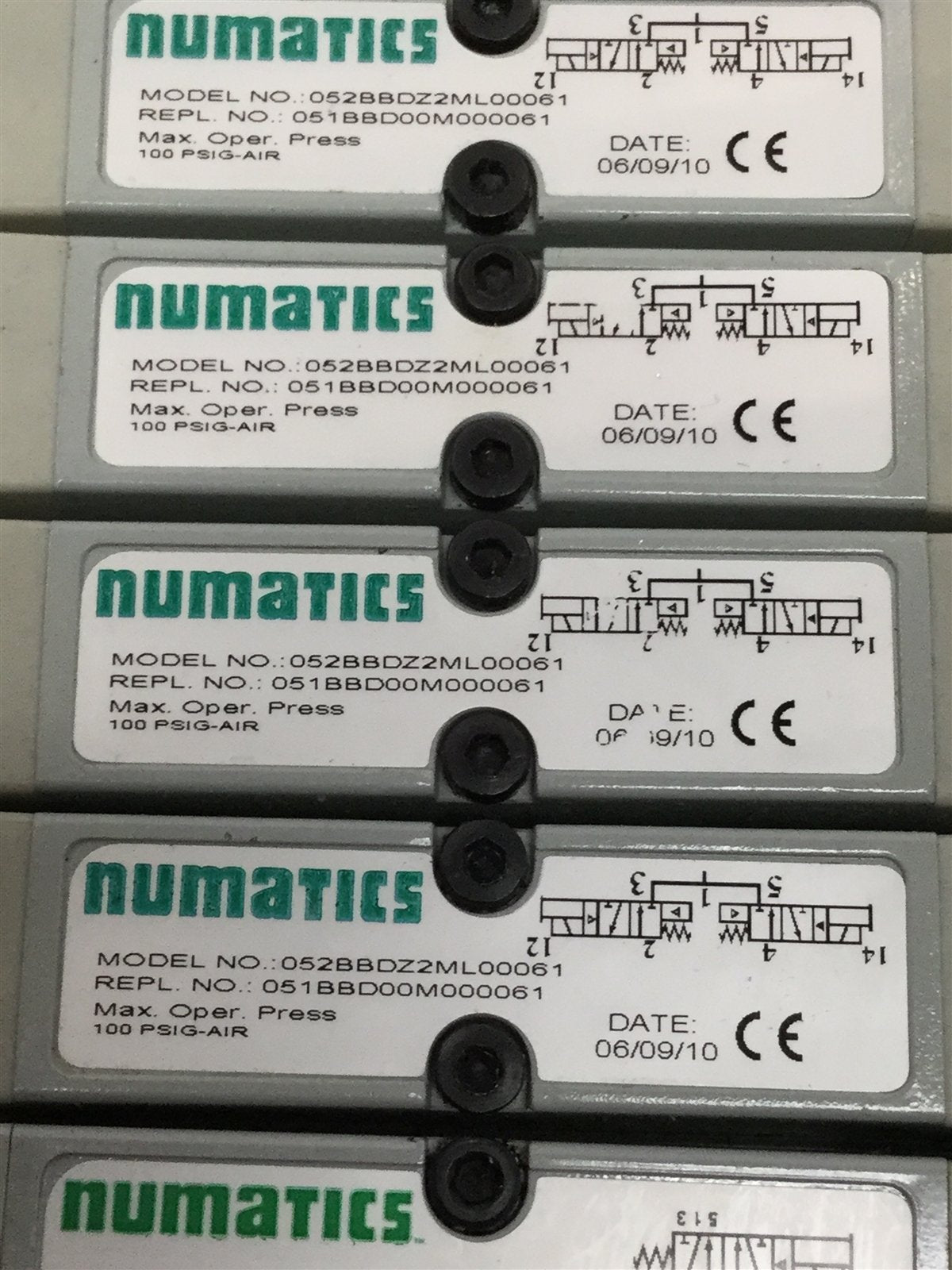 Used Bank of 8 Numatics 052BBDZ2ML, 052BA4Z2ML Solenoid Valves w/ Manifold 24VDC