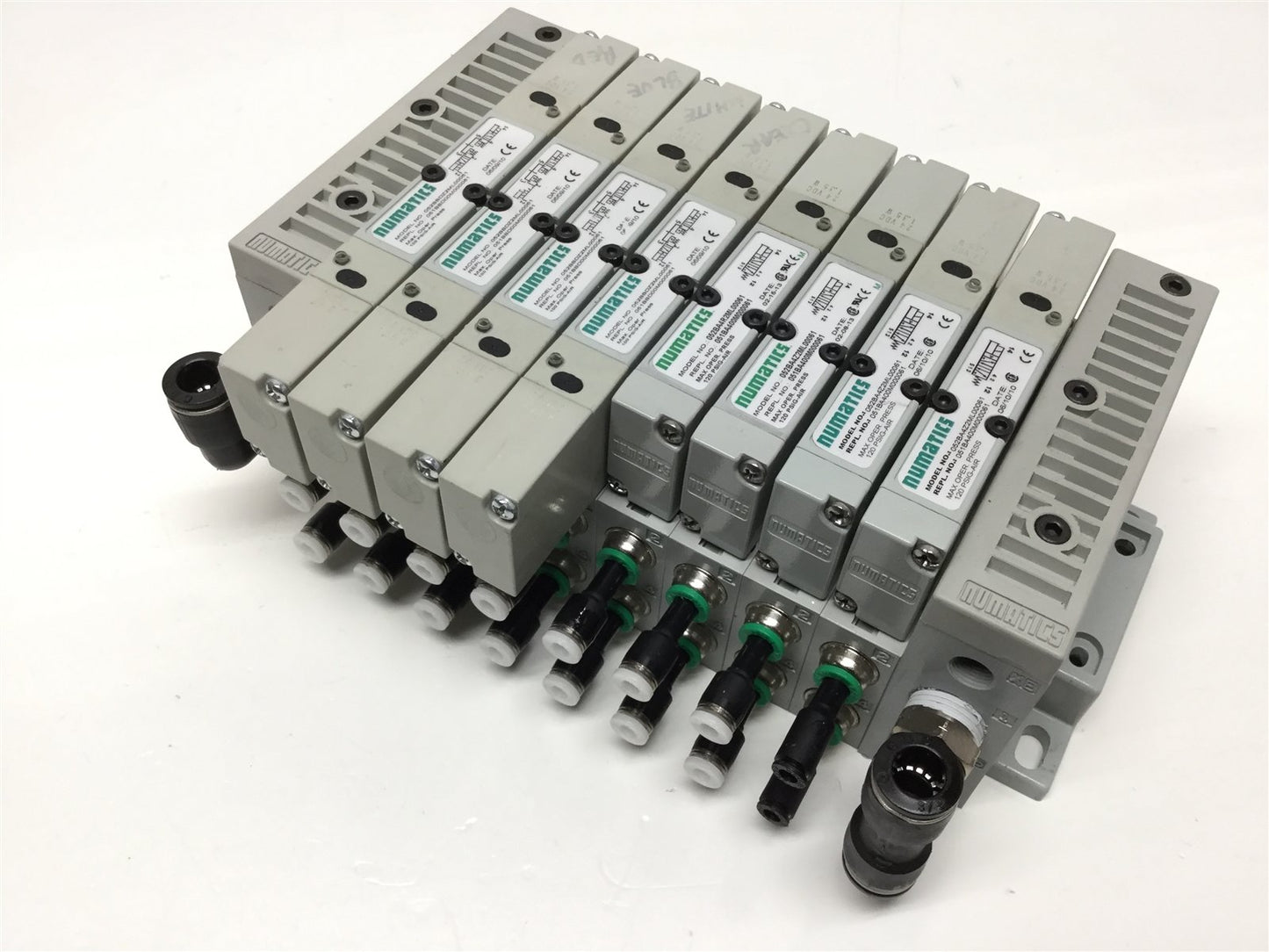 Used Bank of 8 Numatics 052BBDZ2ML, 052BA4Z2ML Solenoid Valves w/ Manifold 24VDC