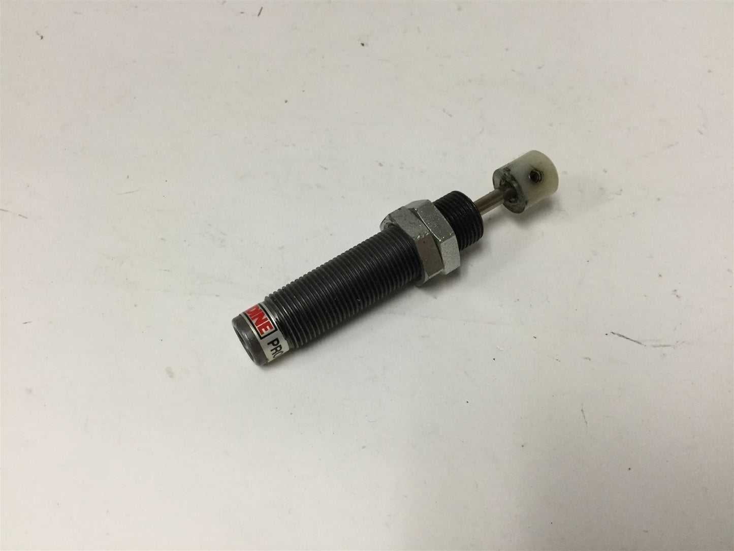 Used Enidine PRO 15 IF-3B Shock Absorber, Barrel: 7/16-28 UNEF Thread, Stroke: 0.4"