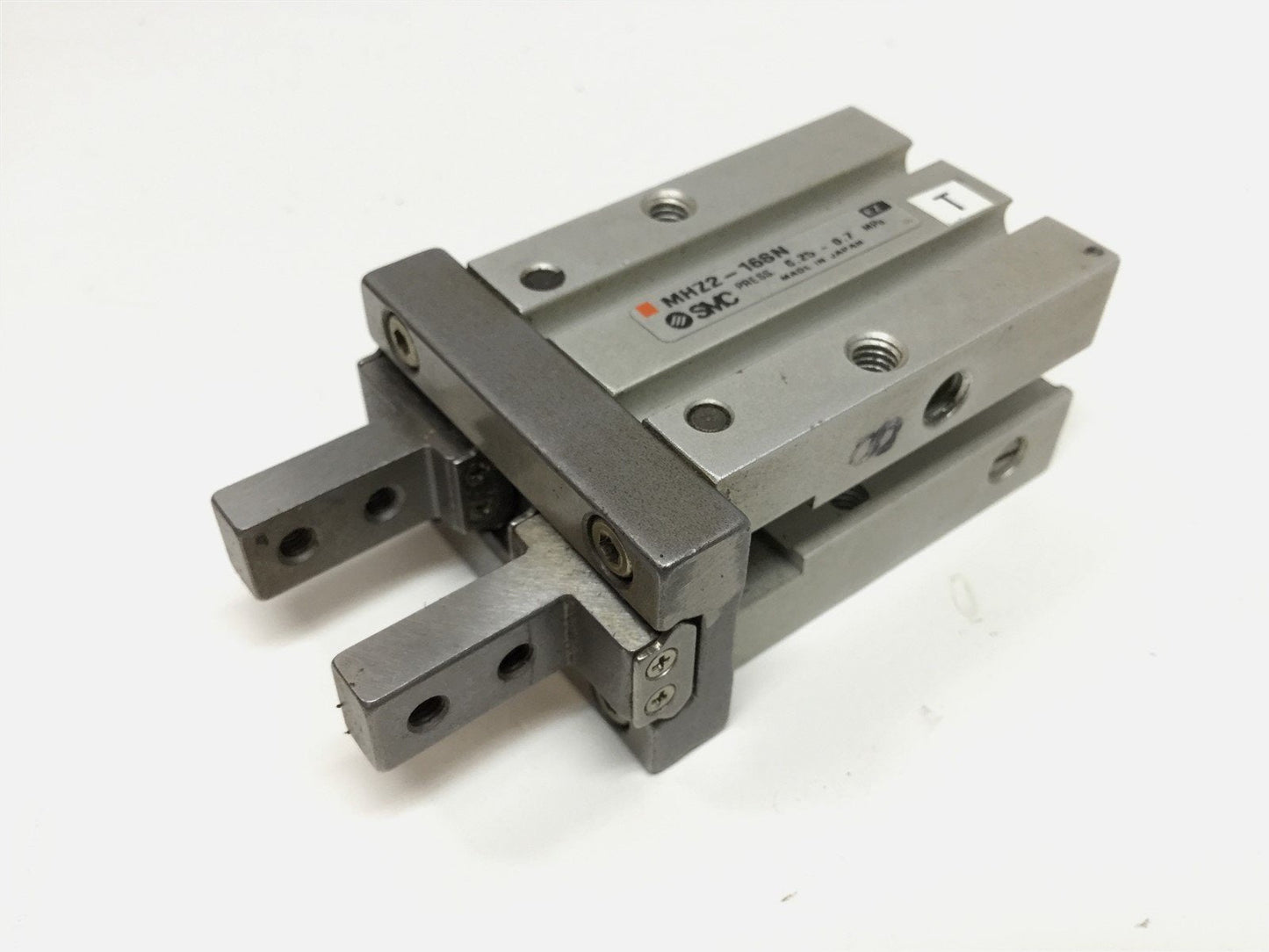 Used SMC MHZ2-16SN Compact Pneumatic Parallel Gripper 16mm Bore, 6mm Stroke, M5