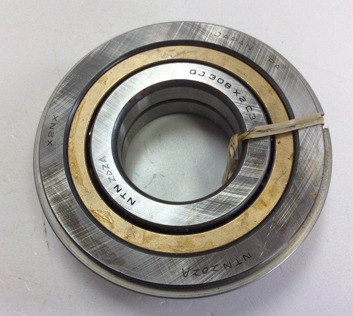 New – Open box NTN QJ308L1NRC3NTN / QJ308X2 C3 Ball Bearing 40 mm Bore x 90 mm OD x 23 mm Width