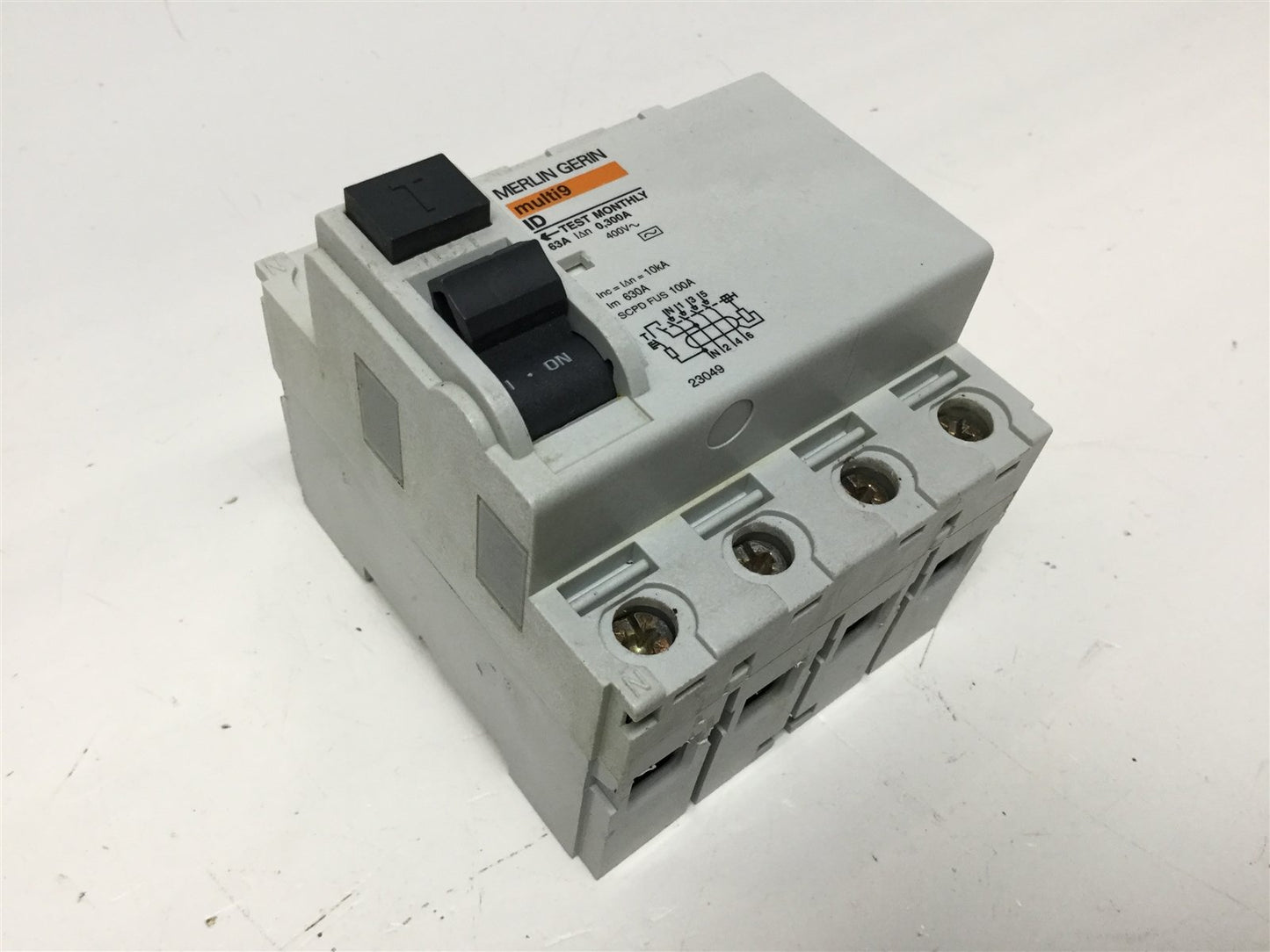 Used Merlin Gerin 23049 Multi9 Instantaneous Circuit Breaker, 4-Pole, 63A, 400VAC