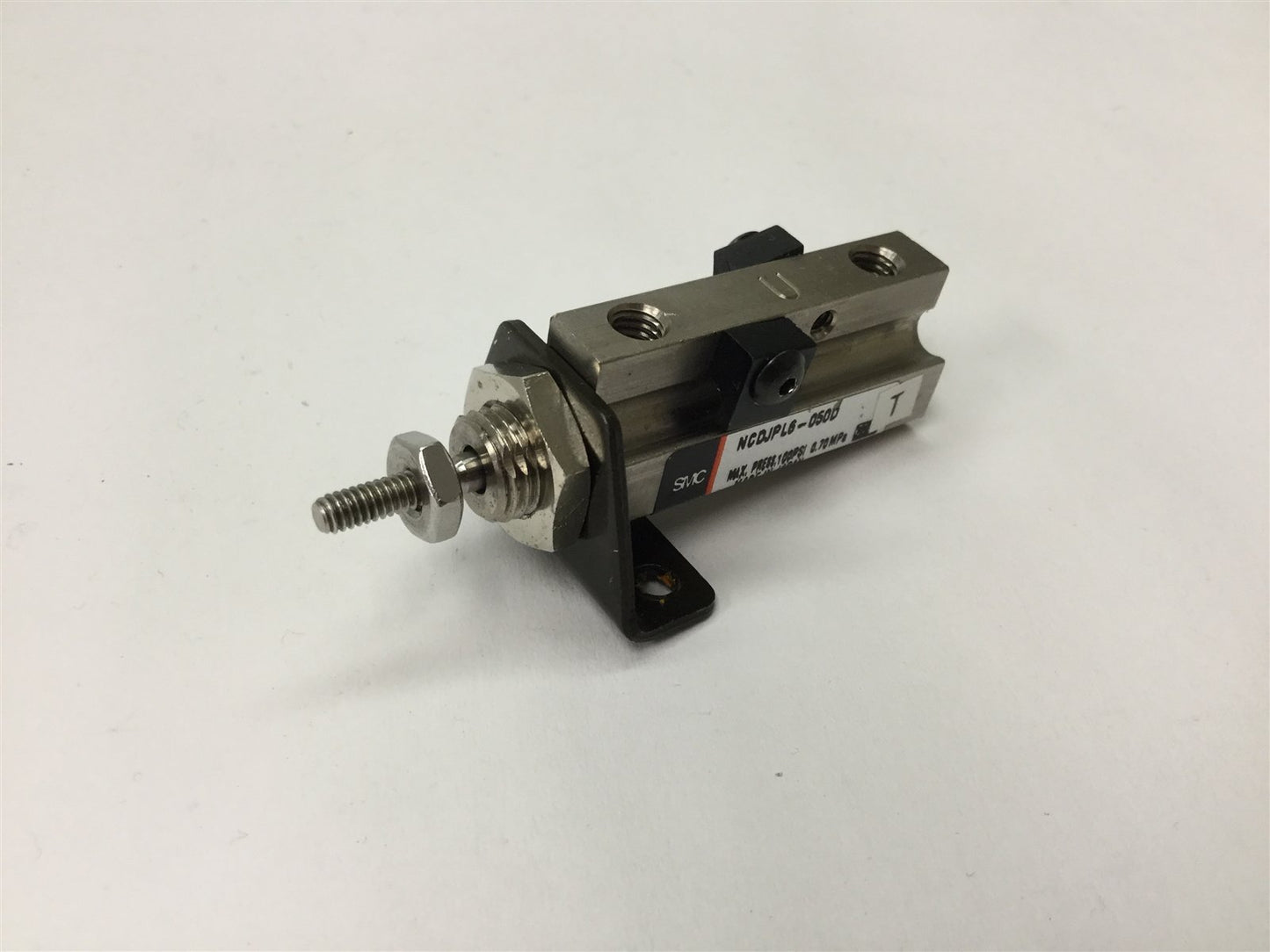 Used SMC NCDJPL6-050D Pin Cylinder, Bore: 1/4", Stroke: 1/2", Pressure: 100psi 0.7MPa