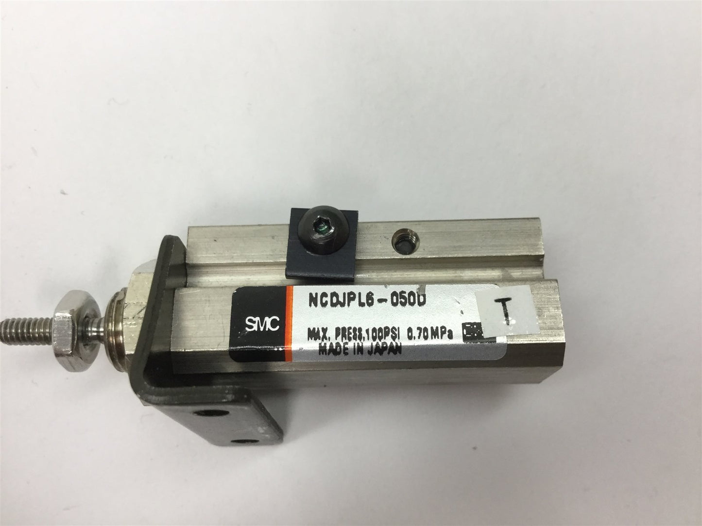 Used SMC NCDJPL6-050D Pin Cylinder, Bore: 1/4", Stroke: 1/2", Pressure: 100psi 0.7MPa
