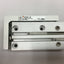 Used SMC MXH6-30 Pneumatic Slide Table, Stroke: 30mm, Bore: 6mm, W/ 2x D-M9P Sensors