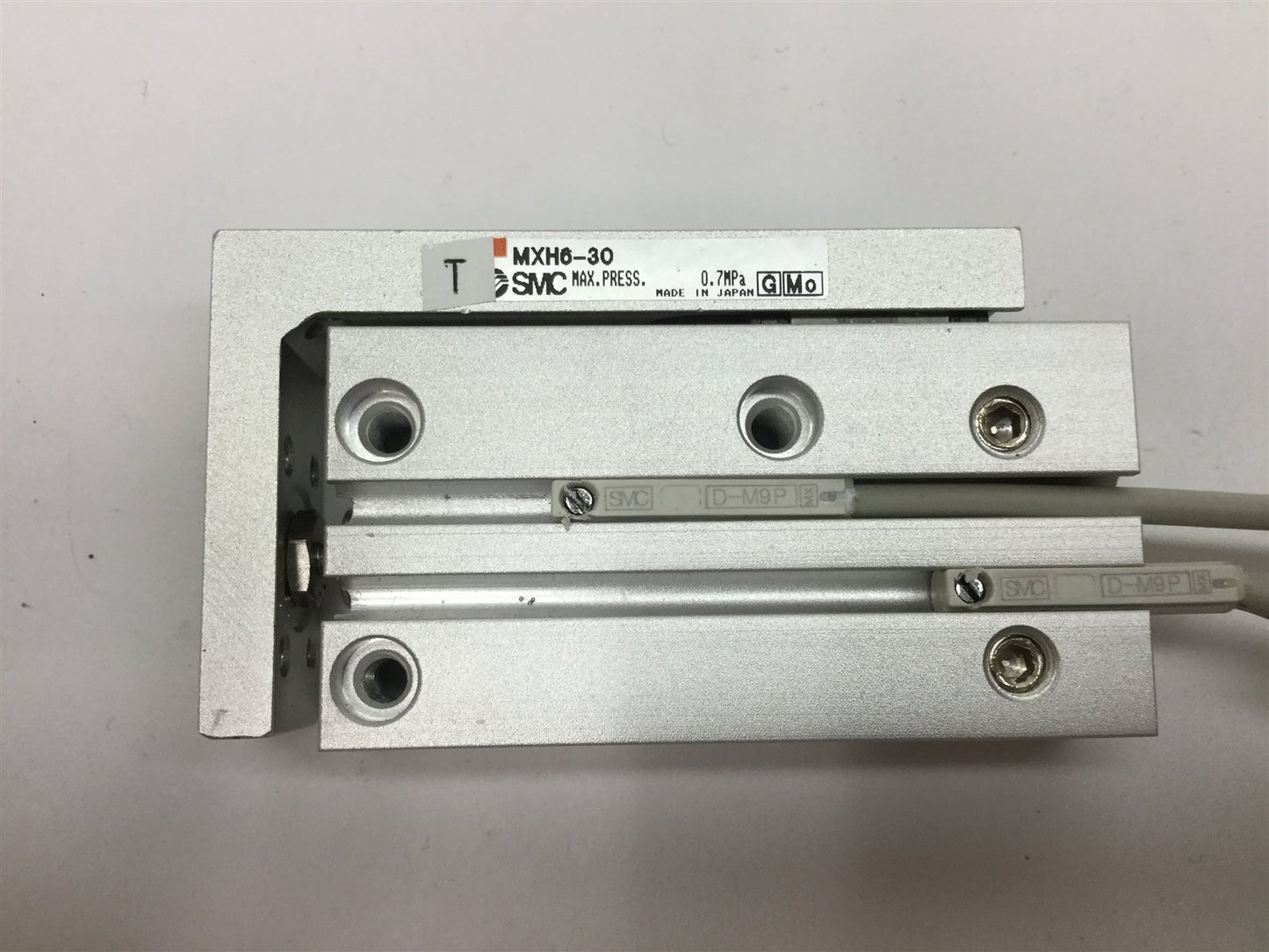 Used SMC MXH6-30 Pneumatic Slide Table, Stroke: 30mm, Bore: 6mm, W/ 2x D-M9P Sensors