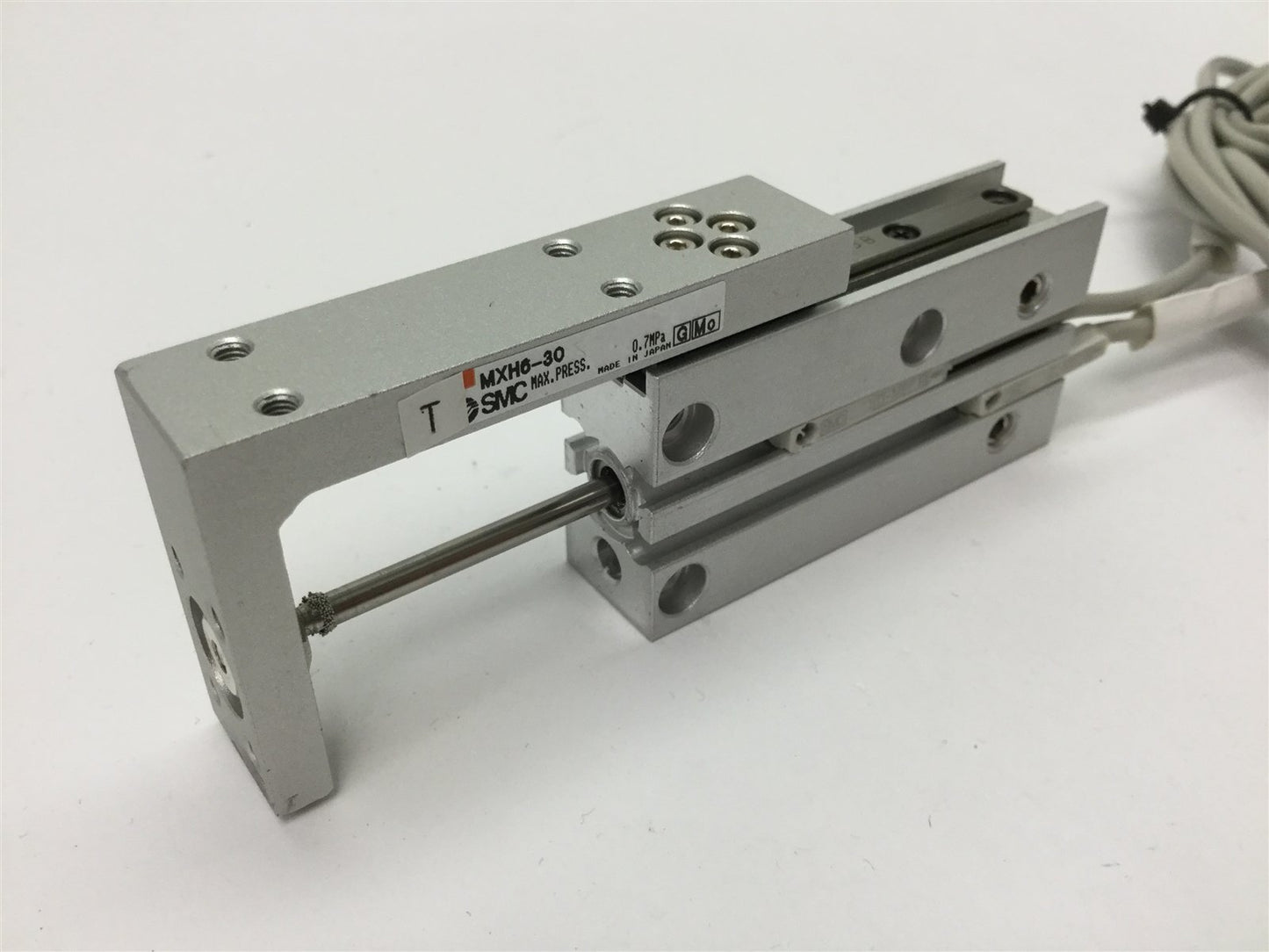 Used SMC MXH6-30 Pneumatic Slide Table, Stroke: 30mm, Bore: 6mm, W/ 2x D-M9P Sensors