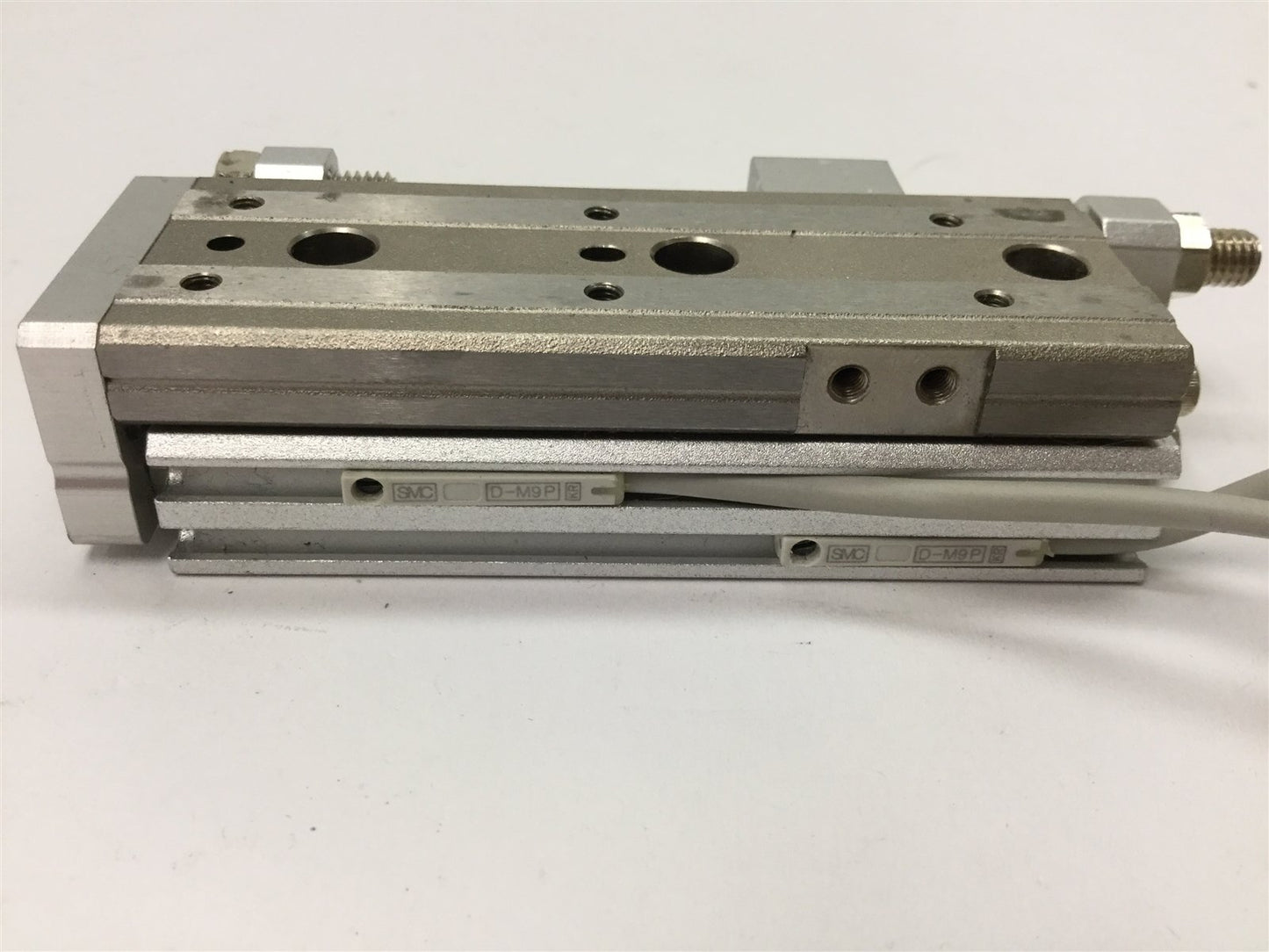 Used SMC MXQ8-40 Pneumatic Slide Table, Stroke: 40mm, Bore: 8mm, W/ 2x D-M9P Sensors