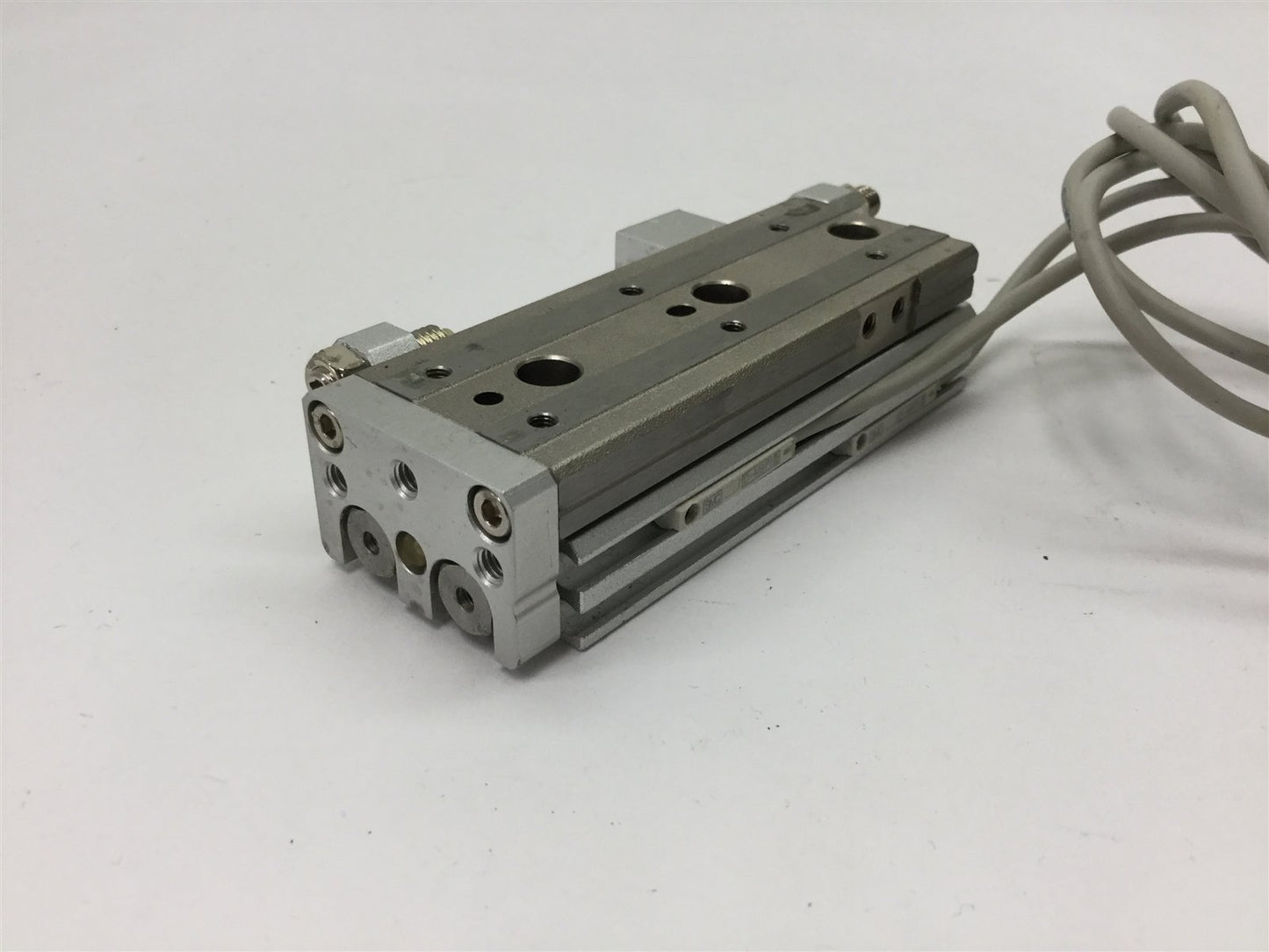 Used SMC MXQ8-40 Pneumatic Slide Table, Stroke: 40mm, Bore: 8mm, W/ 2x D-M9P Sensors