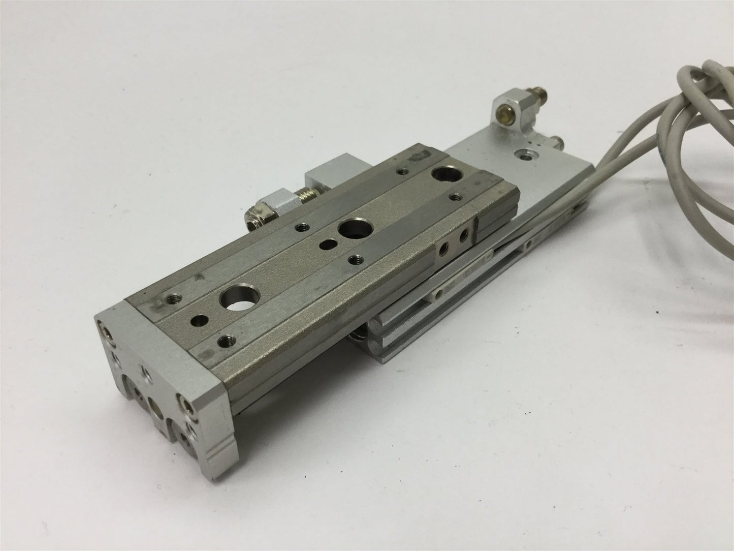 Used SMC MXQ8-40 Pneumatic Slide Table, Stroke: 40mm, Bore: 8mm, W/ 2x D-M9P Sensors