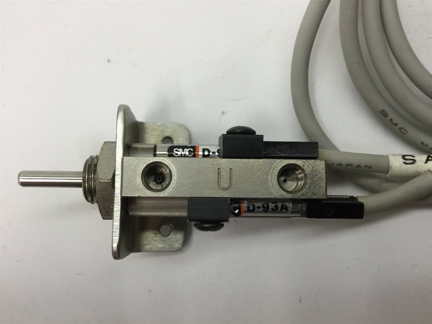 Used SMC NCDJPB6-037D-B Pin Cylinder, Stroke: 3/8", Bore: 1/4", With 2x D-93A Sensors