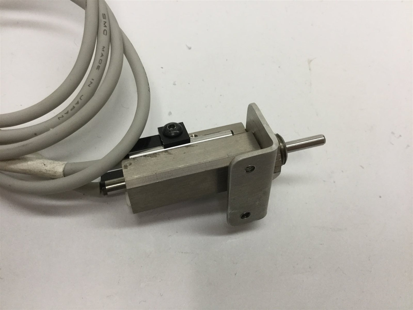 Used SMC NCDJPB6-037D-B Pin Cylinder, Stroke: 3/8", Bore: 1/4", With 2x D-93A Sensors