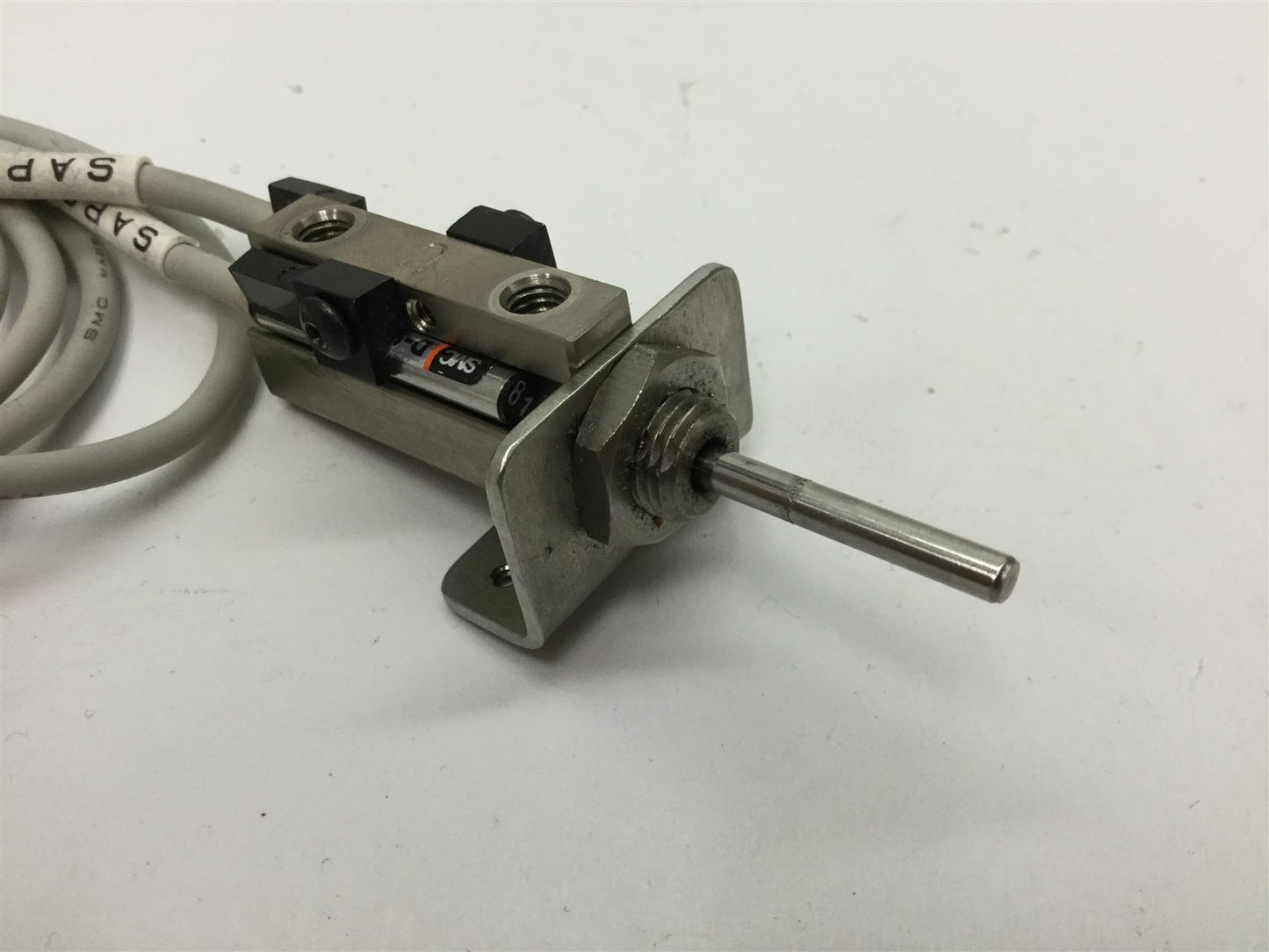 Used SMC NCDJPB6-037D-B Pin Cylinder, Stroke: 3/8", Bore: 1/4", With 2x D-93A Sensors