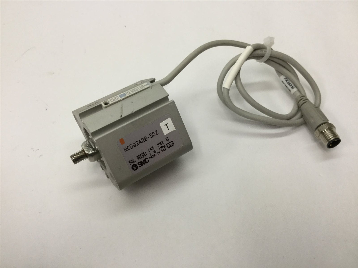 Used SMC NCDQ2A20-5DZ Compact Cylinder, Stroke: 5mm, Bore: 20mm, With D-M9P Sensor