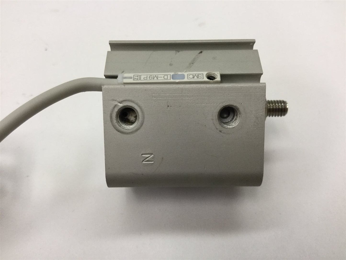 Used SMC NCDQ2A20-5DZ Compact Cylinder, Stroke: 5mm, Bore: 20mm, With D-M9P Sensor