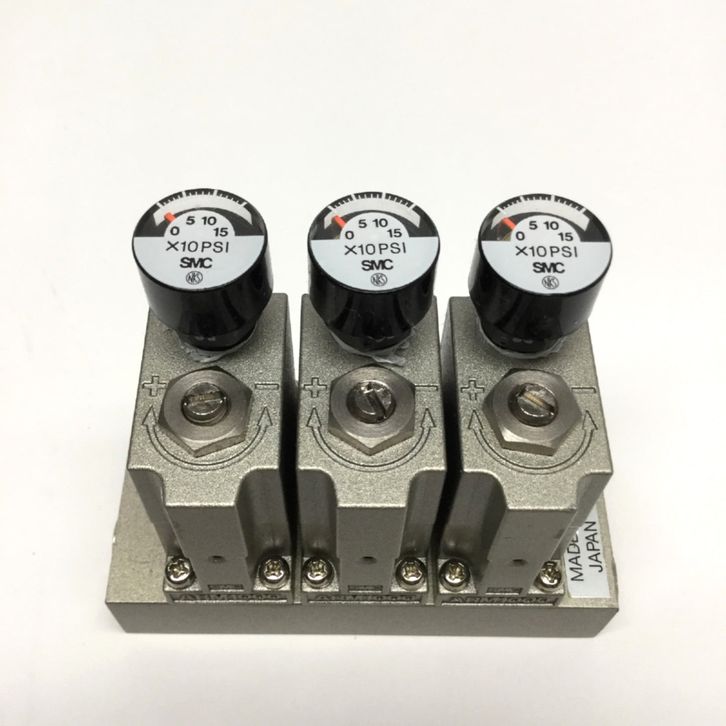 Used SMC ARM1000-3A1-N01G Manifold Regulators, 3-Station, 1/8" NPT w/Gauges 0-150psi