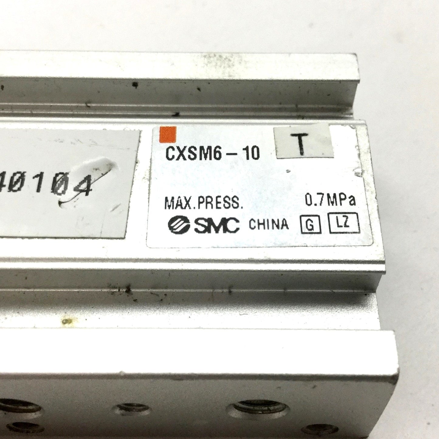 Used SMC CXSM6-10 Double Rod Pneumatic Cylinder, Bore: 6mm, Stroke: 10mm, M5x0.8 Rust