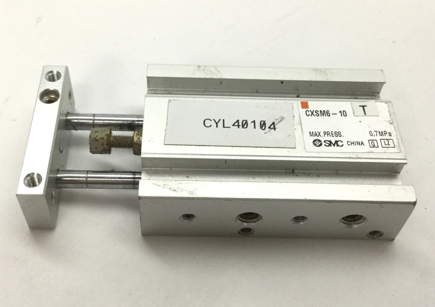 Used SMC CXSM6-10 Double Rod Pneumatic Cylinder, Bore: 6mm, Stroke: 10mm, M5x0.8 Rust