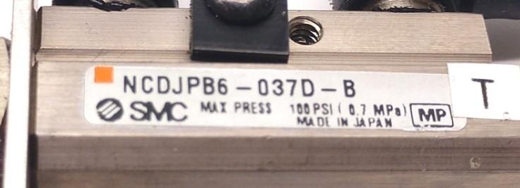 Used SMC NCDJPB6-037D-B Pin Cylinder, Double Action, Stroke: 3/8", Bore: 1/4"