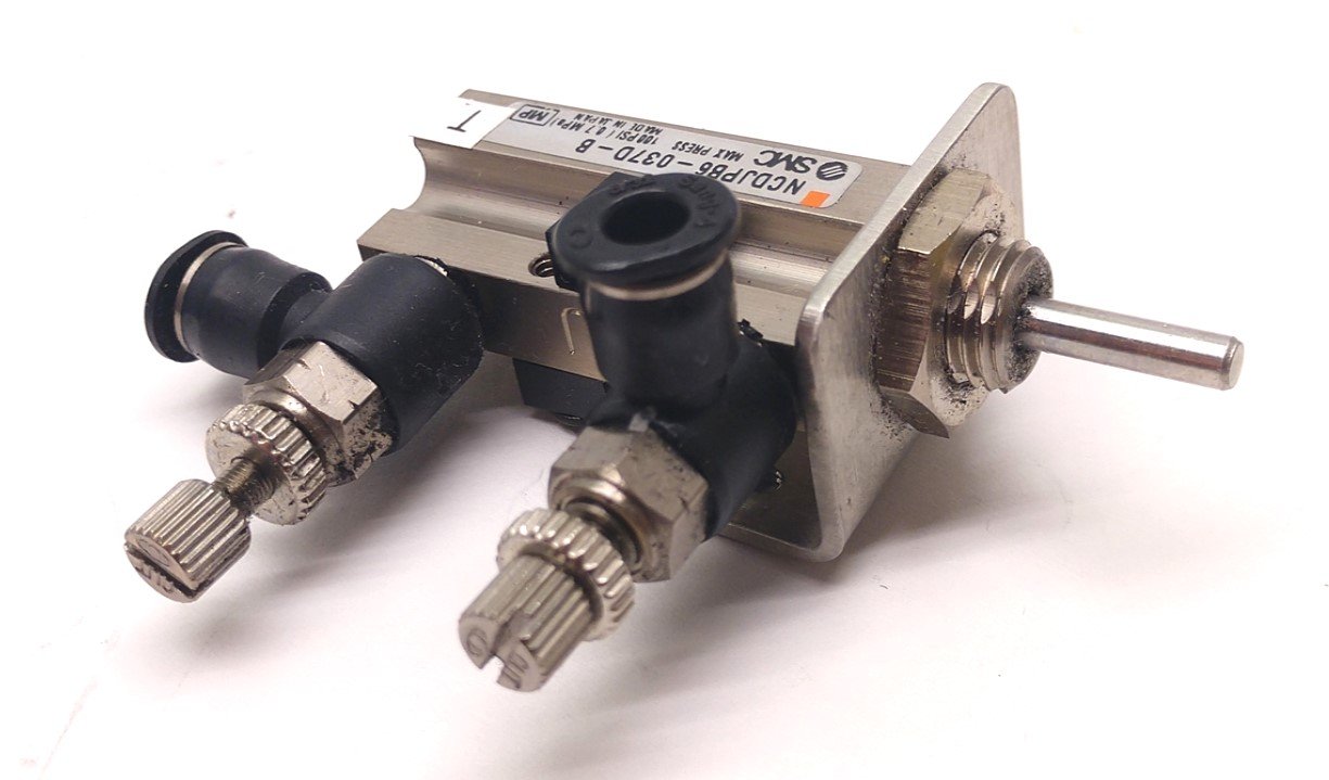 Used SMC NCDJPB6-037D-B Pin Cylinder, Double Action, Stroke: 3/8", Bore: 1/4"