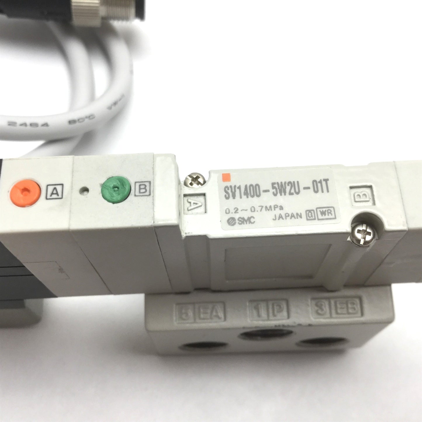 Used SMC SV1400-5W2U-01T Solenoid Valve 3-Position 5-Port, 24VDC, 0.2-0.7MPa, 1/8"NPT