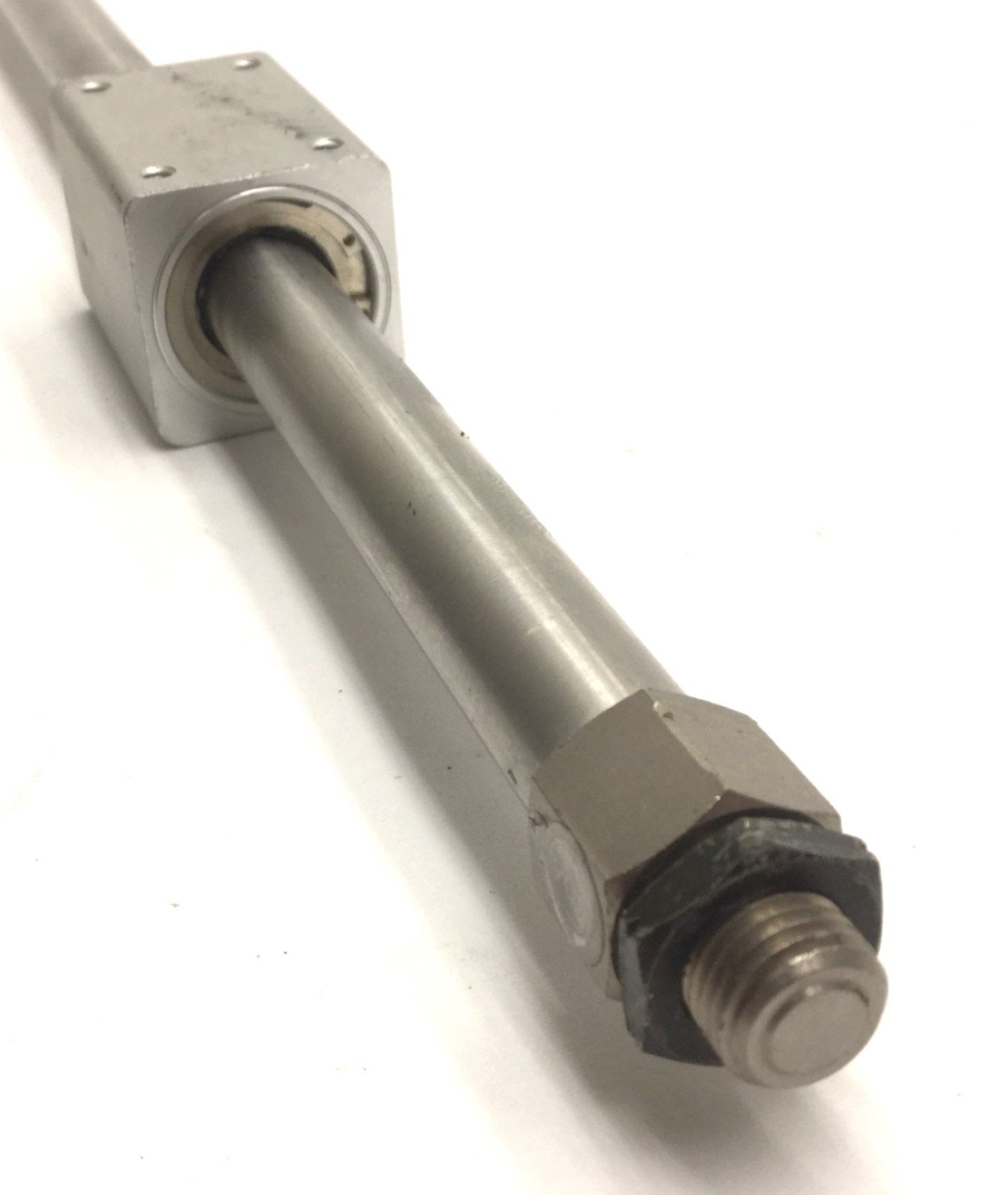 Used SMC NCY2B10H-1200 Rodless Cylinder, 3/8" Bore, 12" Stroke, 100PSI Max