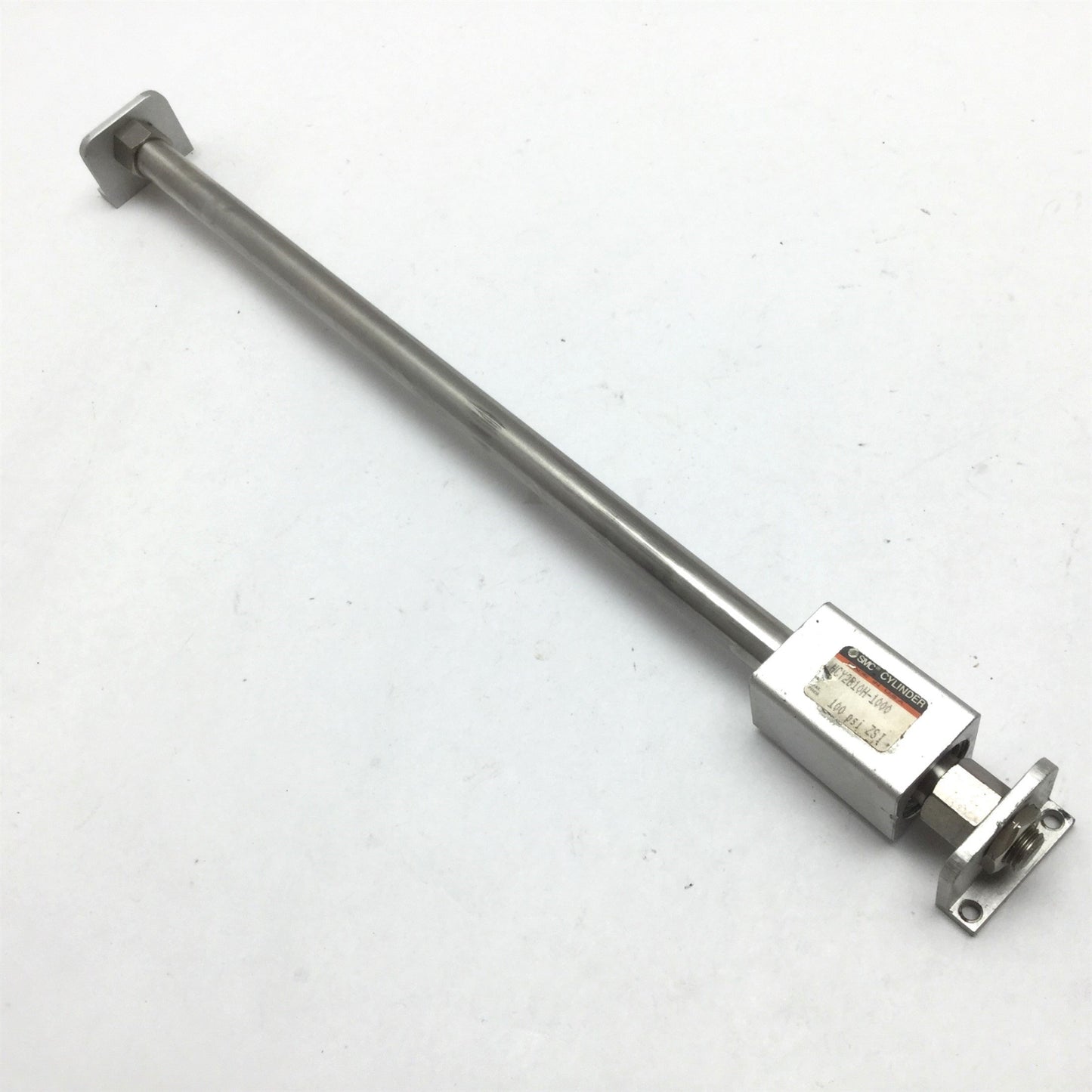 Used SMC NCY2B10H-1000 Rodless Cylinder, Bore: 3/8", Stroke: 10", With Brackets