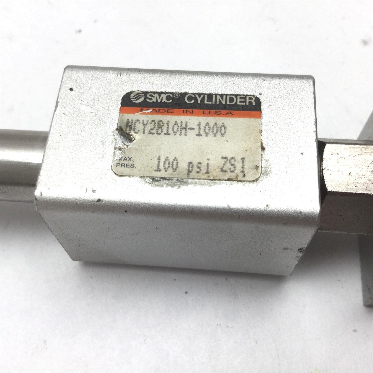 Used SMC NCY2B10H-1000 Rodless Cylinder, Bore: 3/8", Stroke: 10", With Brackets