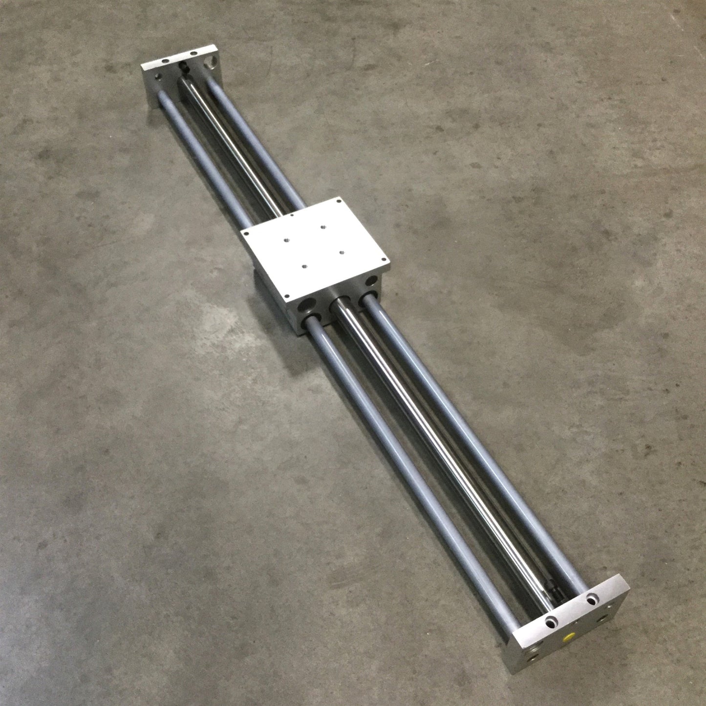 Used Phd CBU061x36-Q Rodless Cylinder Linear Slide Table, 3/4" Shaft, 10" Stroke