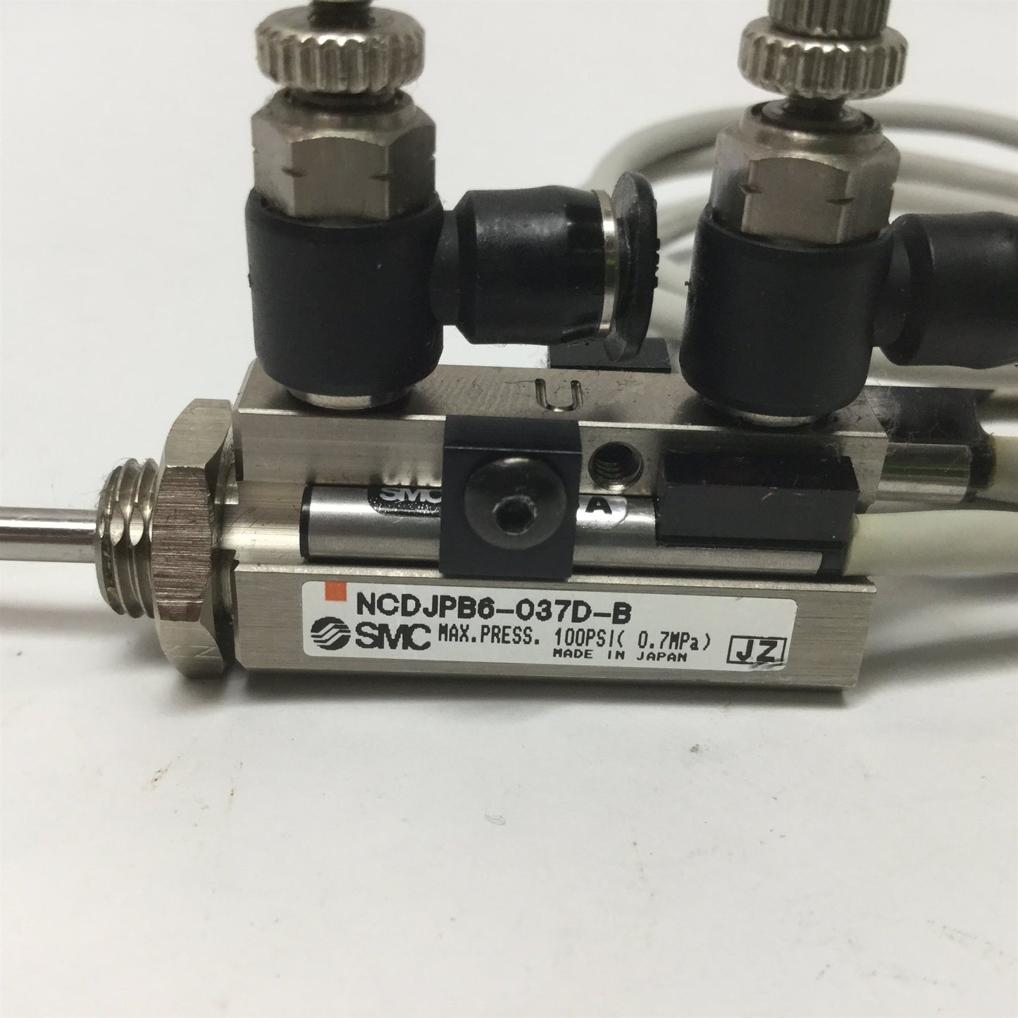 Used SMC NCDJPB6-037D-B Mini Pin Cylinder 3/8" Stroke, 6mm Bore w/D-93A Switches
