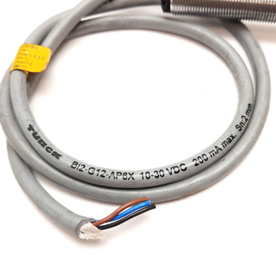 Used Turck Bi2-G12-AP6X Proximity Sensor, Range: 2mm, Barrel: M12 Thread, 10-30VDC