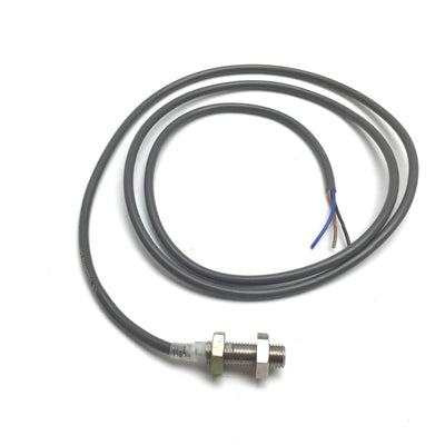 Used Omron E2E-X1R5E2 Proximity Sensor, Range: 1.5mm, Barrel: M8, 12-24VDC, 3' Cable